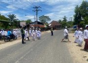Personil Pos Lantas Polsek Barumun Tengah Laksanakan Pam Padat siang, di depan Mesjid Ar Rahim Desa Binanga